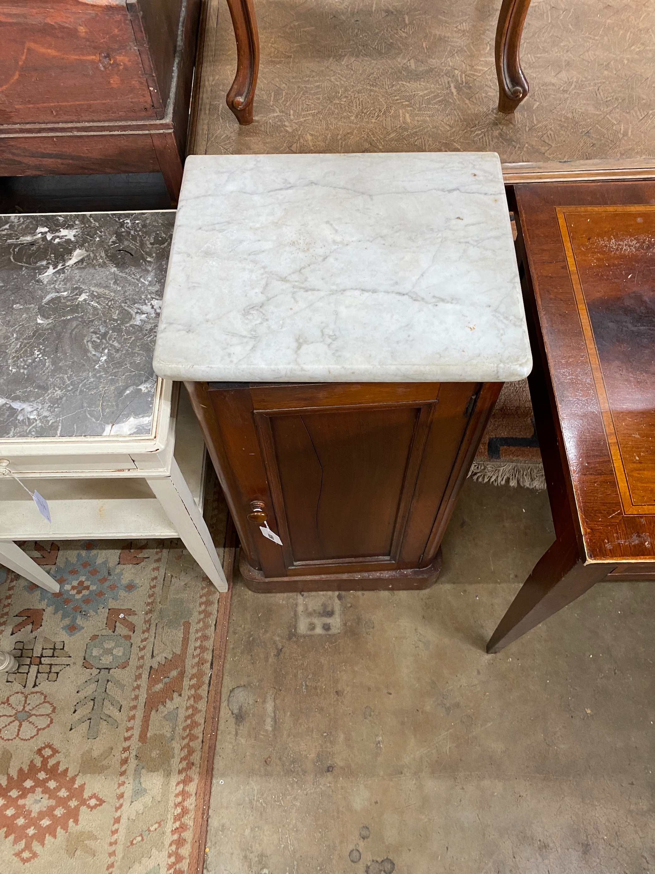 A Victorian mahogany white marble-topped bedside cabinet, width 39cm, depth 33cm, height 78cm